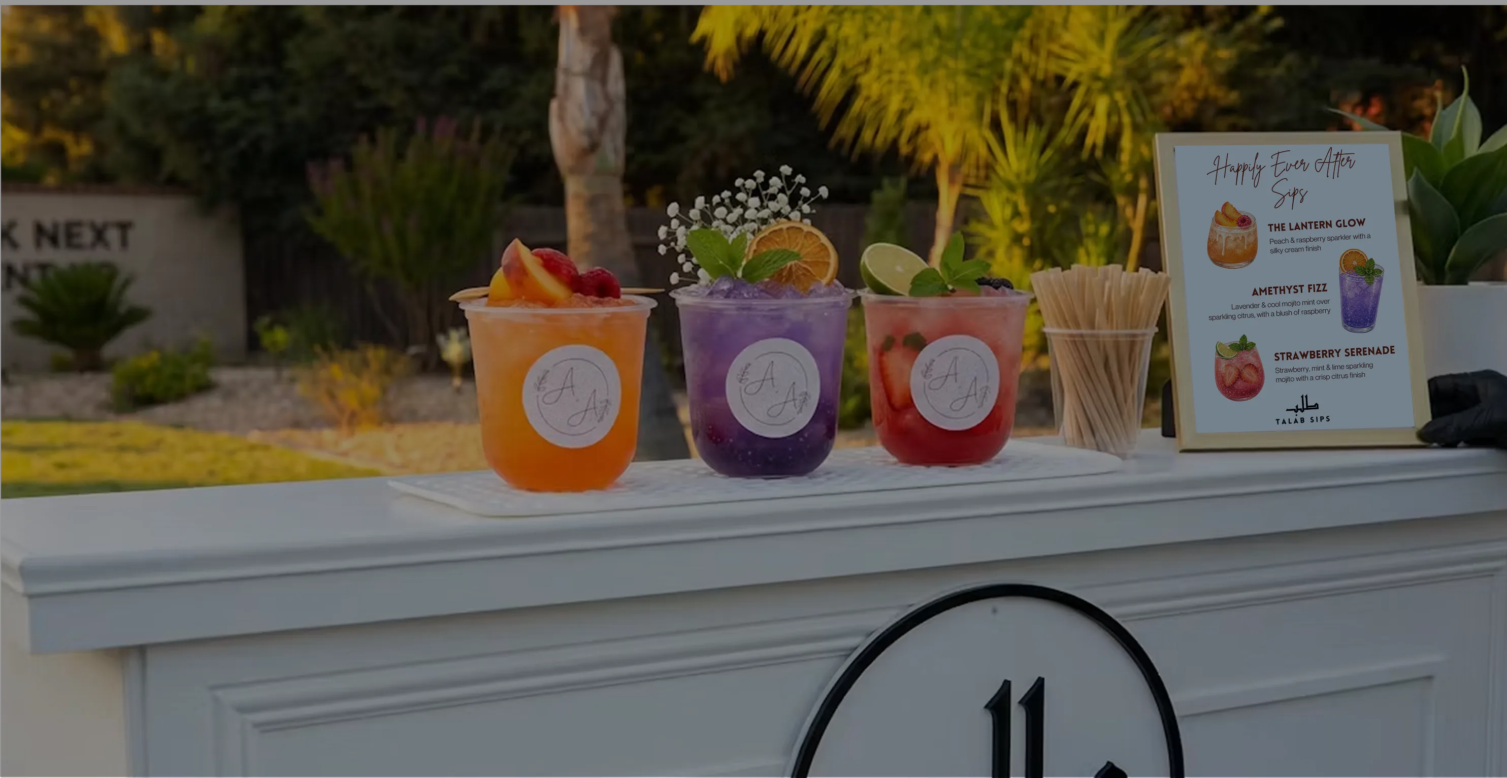 Talab Sips mocktail cart with three signature drinks and a custom menu